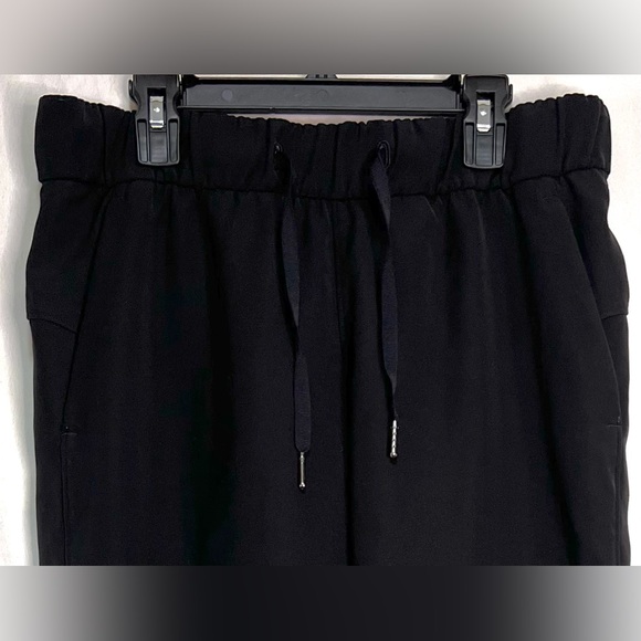 ✨LIKE NEW✨ Lululemon On The Fly Pant Woven 27" Black | Travel | Activewear - Picture 7 of 12